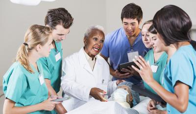 Medical students training with the doctor. Medical students training with the doctor.